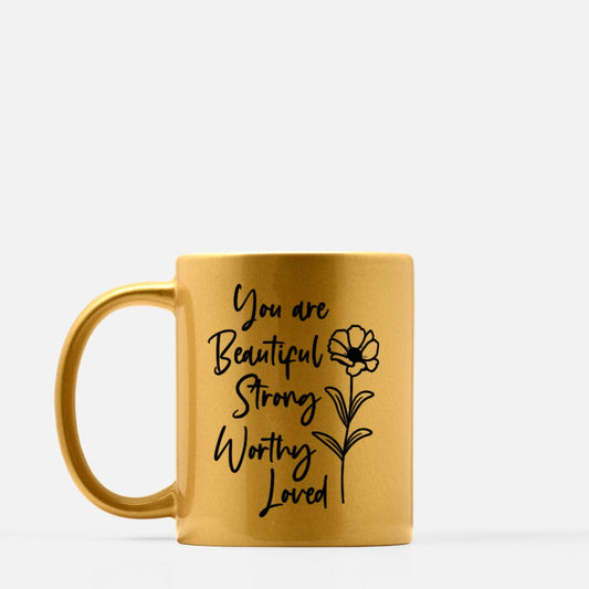 Gold mug with 'You are Beautiful Strong Worthy Loved' text