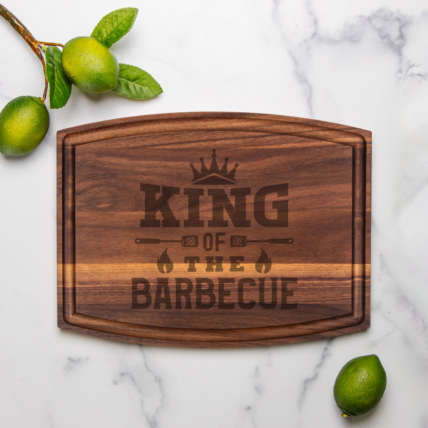 Engraved walnut cutting board for barbecue with groove