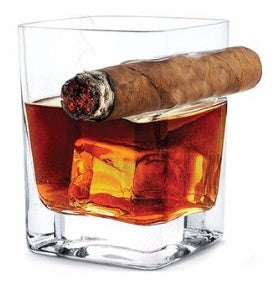 Whiskey glass with cigar holder and drink