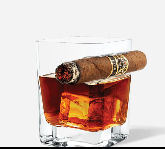 Cigar glass with whiskey and cigar holder