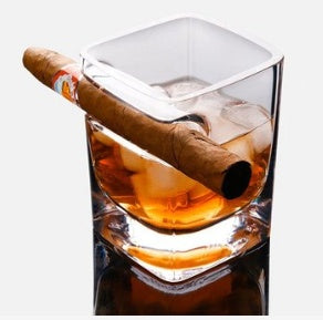 Whiskey glass with built-in cigar holder